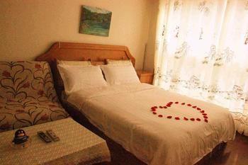 Yangguang Xingzuo Apartment Hotel Chongqing Bagian luar foto