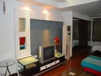 Yangguang Xingzuo Apartment Hotel Chongqing Bagian luar foto