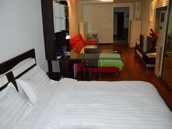 Yangguang Xingzuo Apartment Hotel Chongqing Bagian luar foto