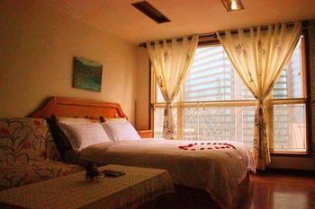 Yangguang Xingzuo Apartment Hotel Chongqing Bagian luar foto