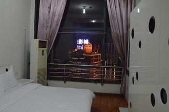 Yangguang Xingzuo Apartment Hotel Chongqing Bagian luar foto